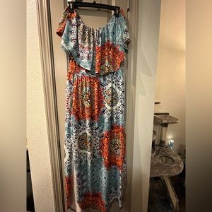 Colorful flowy off the shoulder dress with pockets!